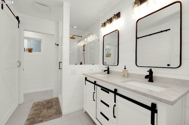 bathroom featuring vanity and an enclosed shower