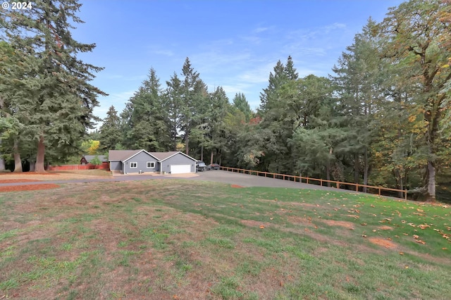 view of yard with a garage