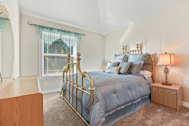 bedroom featuring light carpet