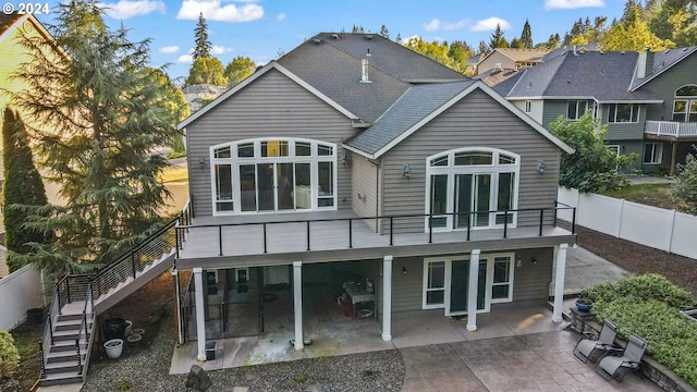 back of property featuring a patio area