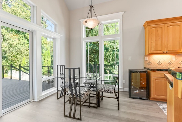 dining room with beverage cooler