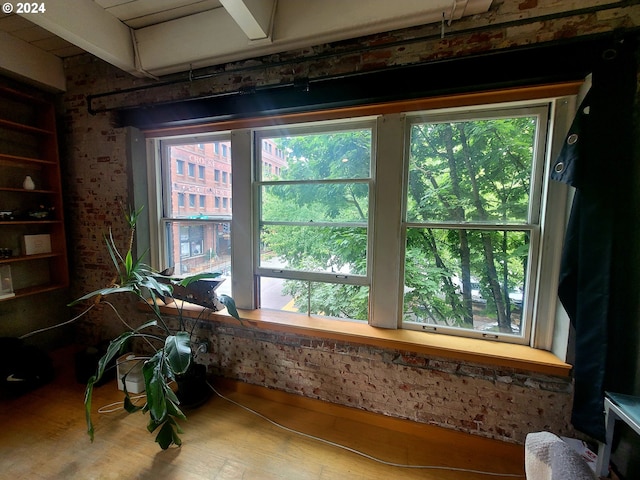 interior space featuring hardwood / wood-style flooring and a wealth of natural light