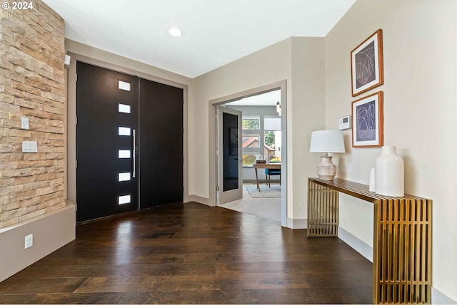 entrance foyer with dark hardwood / wood-style floors