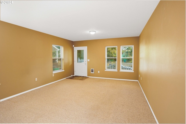 view of carpeted spare room