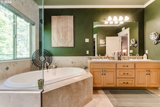 bathroom featuring crown molding, a garden tub, a sink, and double vanity