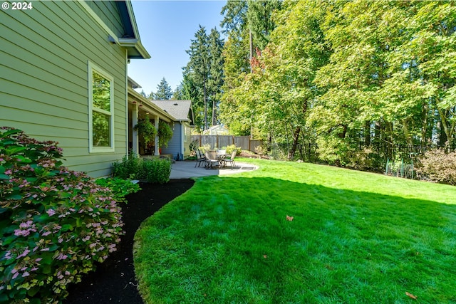 view of yard with a patio area and fence