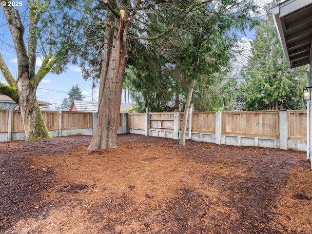 view of yard featuring a fenced backyard