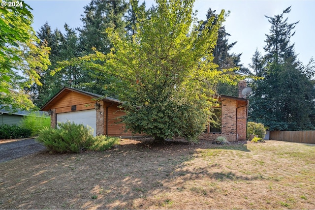 view of side of property with a garage