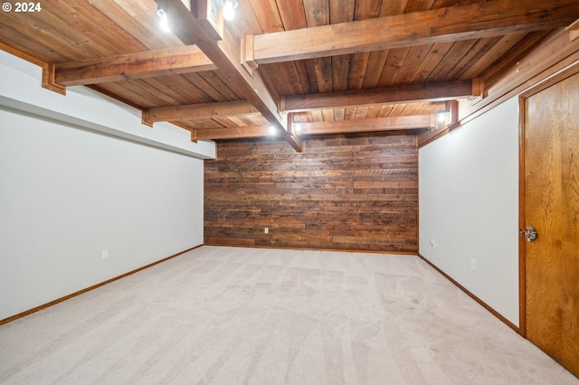 interior space with wood ceiling, wooden walls, beam ceiling, and light carpet