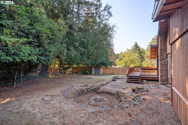 view of yard with a deck