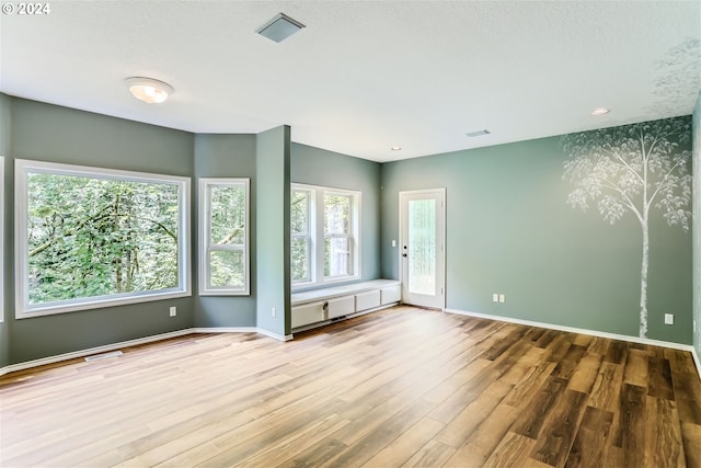 interior space with hardwood / wood-style floors