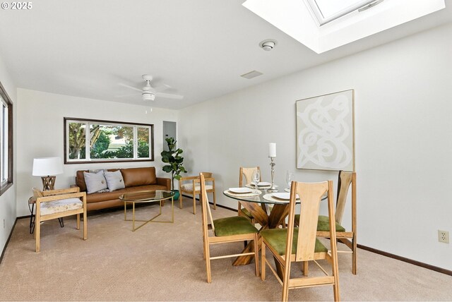 160 Beatrice Ave, Gladstone, OR 97027 - dining space with a skylight, light colored carpet, and ceiling fan