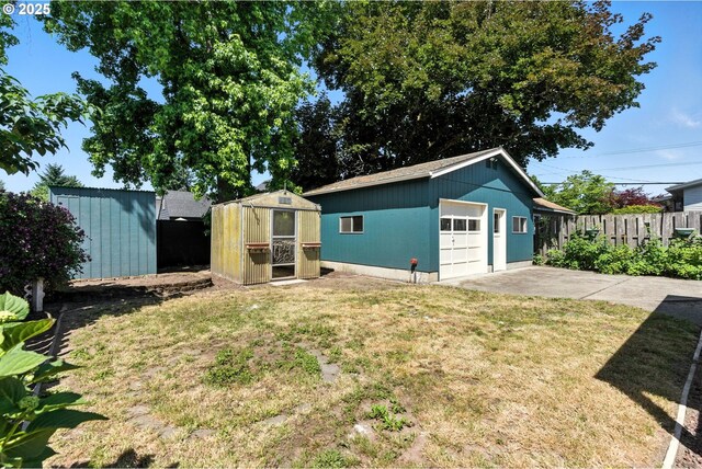 160 Beatrice Ave, Gladstone, OR 97027 - exterior space featuring an outdoor structure, a garage, and concrete driveway