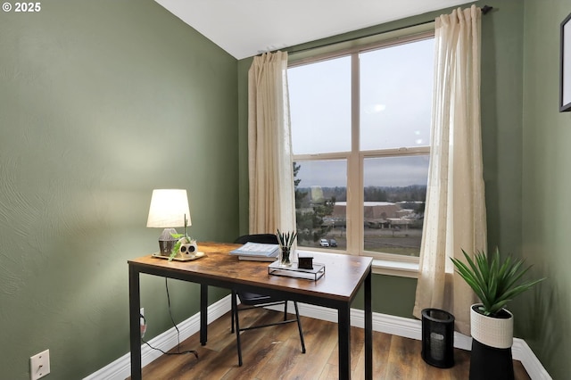 office space with hardwood / wood-style floors