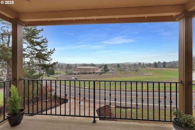 balcony featuring a rural view