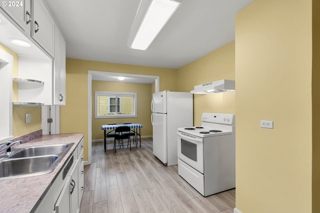 kitchen featuring sink, white appliances, white cabinetry, light hardwood / wood-style floors, and exhaust hood