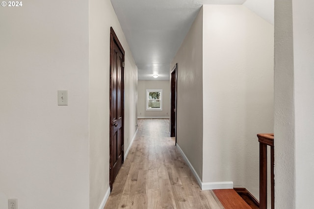 hallway featuring light wood-type flooring