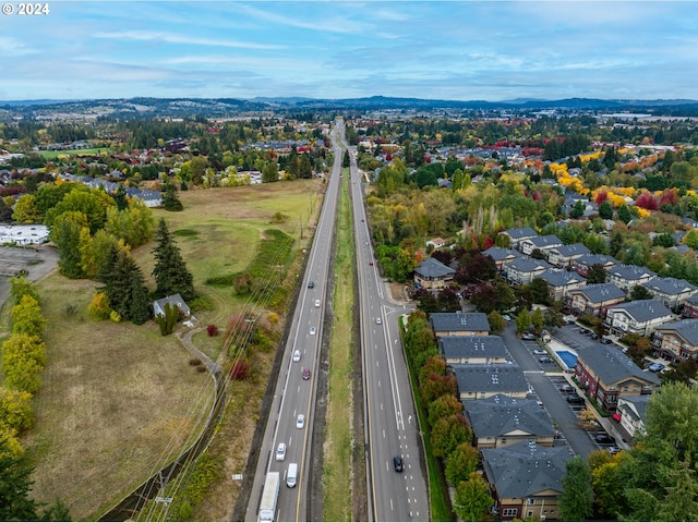 birds eye view of property with a residential view
