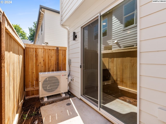 view of patio / terrace featuring ac unit