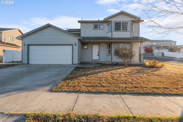 front of property with a garage