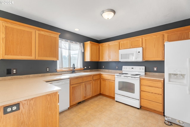 kitchen with white appliances and sink