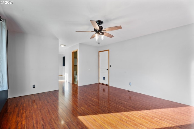 empty room featuring ceiling fan and wood-type flooring