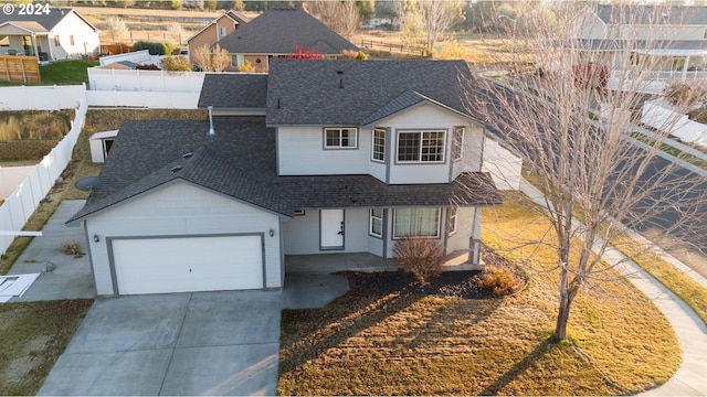 view of front of house with a garage