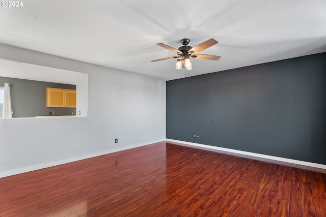 spare room featuring ceiling fan and wood-type flooring