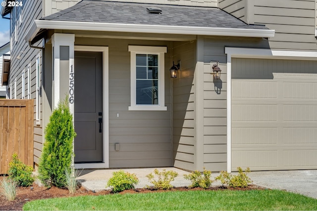 entrance to property featuring a garage