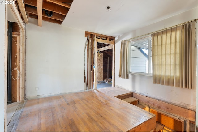 unfurnished room with light hardwood / wood-style flooring