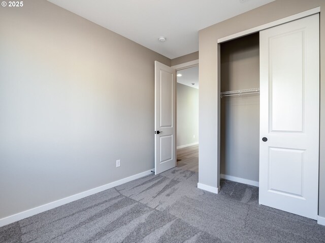 spare room with carpet flooring and a wealth of natural light