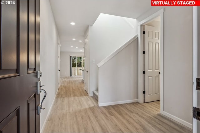 entryway with light wood-type flooring