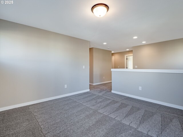 unfurnished room featuring carpet flooring