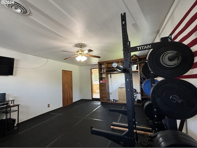 exercise area with ceiling fan