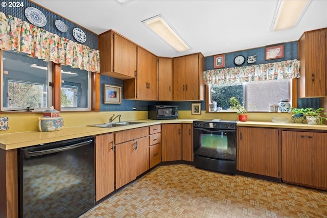 kitchen featuring sink and black appliances