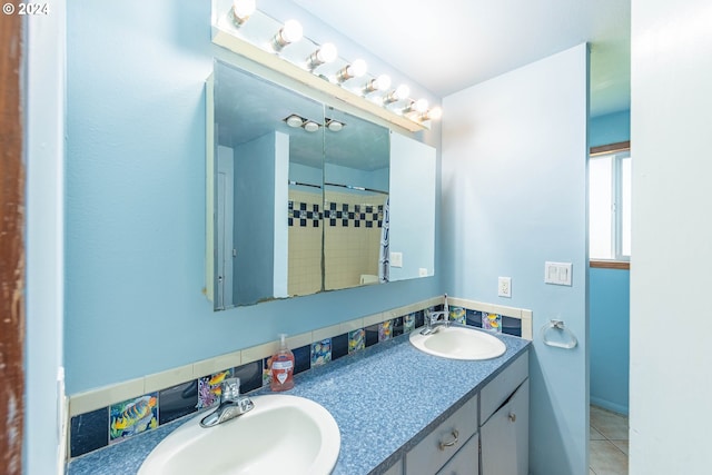 bathroom with vanity and tile patterned flooring