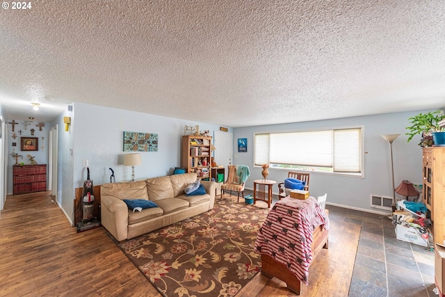 living room featuring a textured ceiling