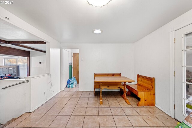 2051 N Park Ave, Eugene, OR 97404 - sitting room featuring light tile patterned floors, beam ceiling, and baseboards