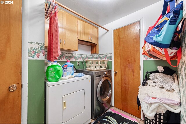 2051 N Park Ave, Eugene, OR 97404 - washroom with washer and clothes dryer and cabinet space