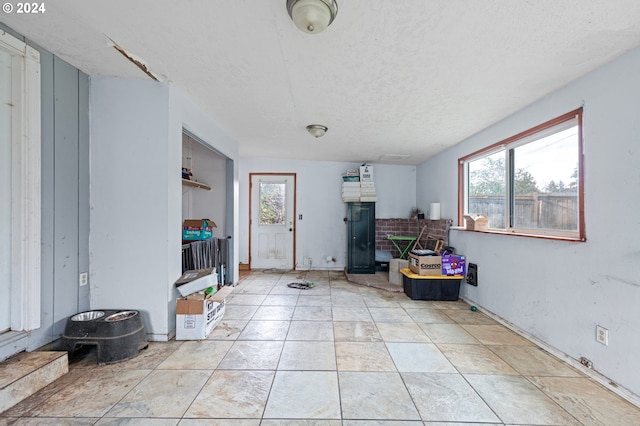 interior space featuring a textured ceiling