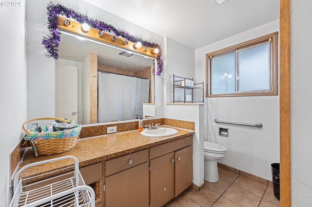 2051 N Park Ave, Eugene, OR 97404 - bathroom with tile patterned flooring, toilet, and vanity