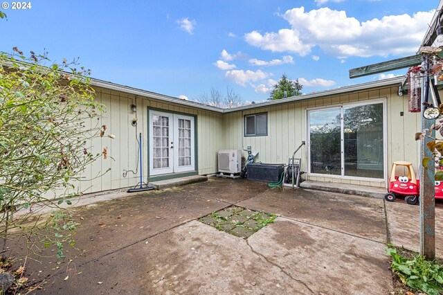 2051 N Park Ave, Eugene, OR 97404 - rear view of property with a patio area, french doors, and ac unit
