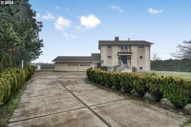 view of front of property featuring a garage