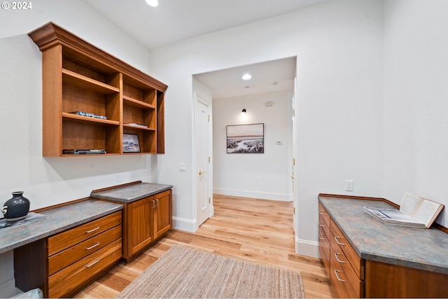 office area with light wood-style floors, recessed lighting, and baseboards