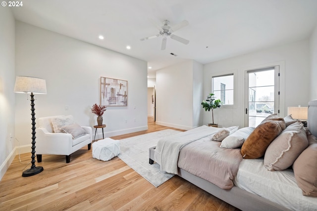 bedroom featuring ceiling fan, baseboards, wood finished floors, and recessed lighting