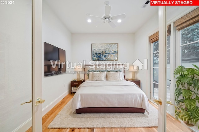 bedroom with access to exterior, ceiling fan, light wood-style flooring, and baseboards