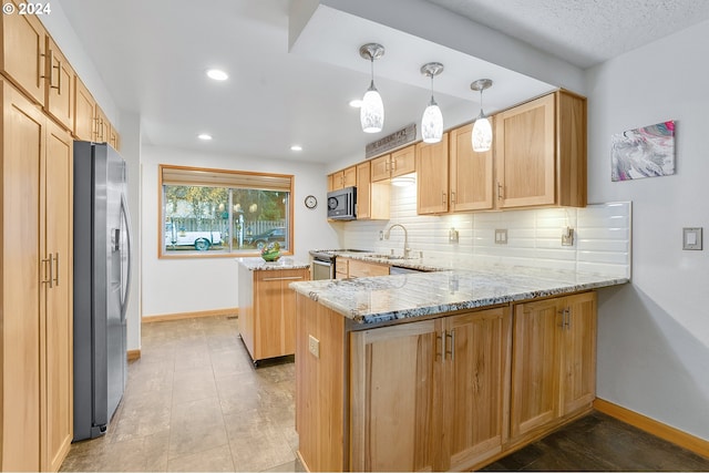 kitchen with kitchen peninsula, backsplash, light stone counters, stainless steel appliances, and light tile patterned floors