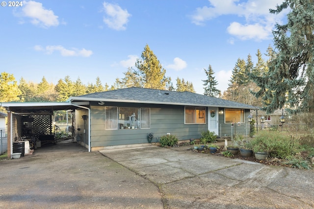 view of front of house featuring a carport