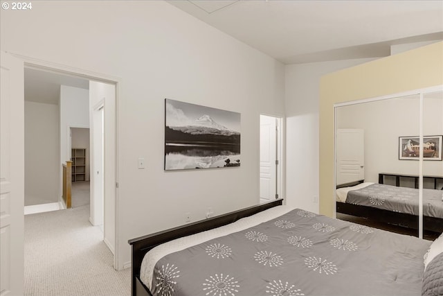 carpeted bedroom with a closet