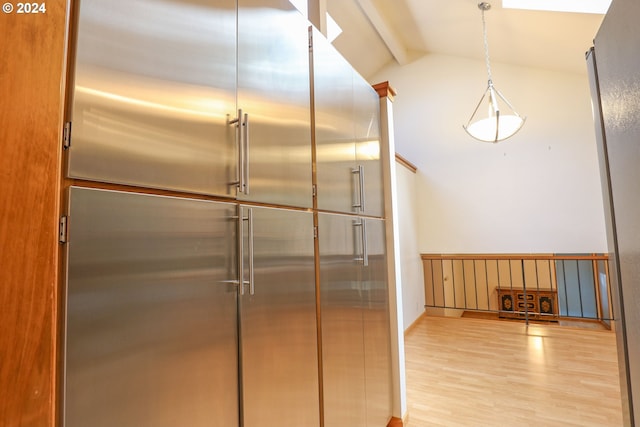 3794 Wilshire Ln, Eugene, OR 97405 - kitchen featuring stainless steel built in refrigerator and wood finished floors